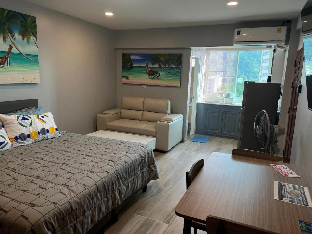 Image 2 of Phuket Apartments near Patong Beach – 28 SQM Studio Apartments with Kitchen, Private Bathroom, Seating area, 65″ Smart TV and Free WIFI