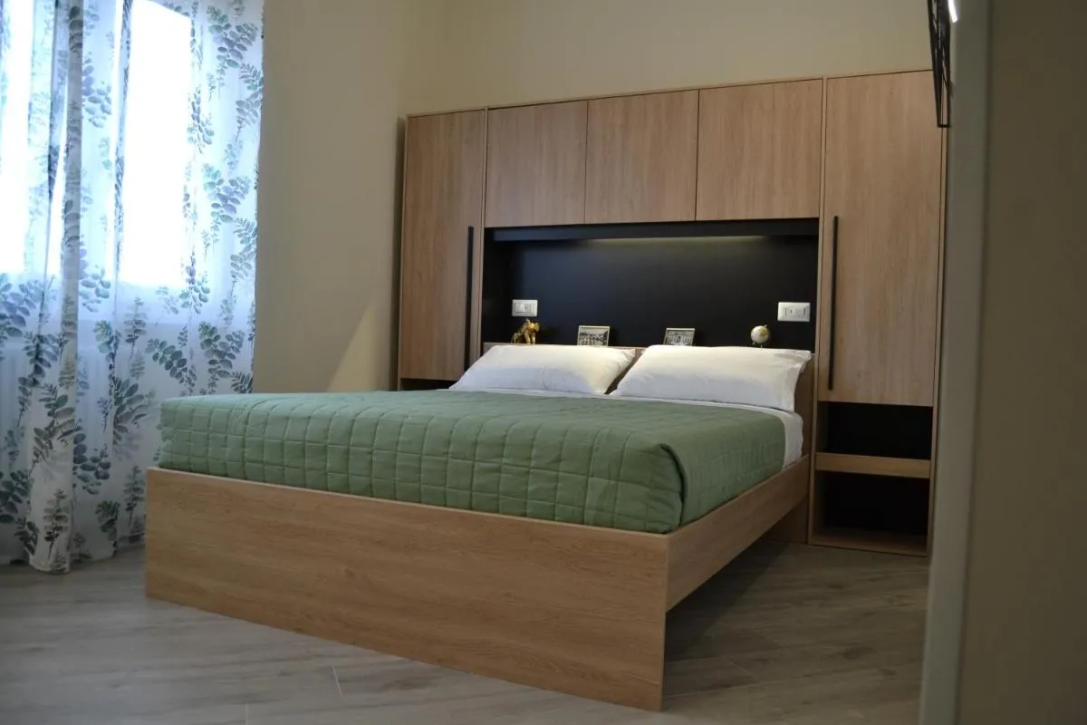 Image 1 of Green and Blue Apartment