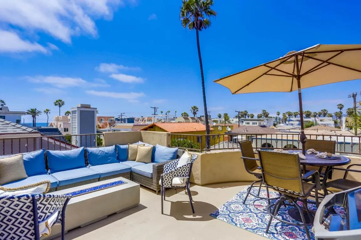 Image of Stunning Ocean View Home w Rooftop Terrace, Firepit, Fast Wifi, AC & Parking!