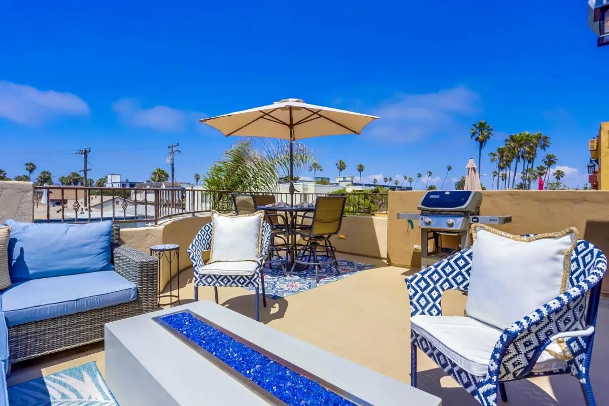 Image 5 of Stunning Ocean View Home w Rooftop Terrace, Firepit, Fast Wifi, AC & Parking!