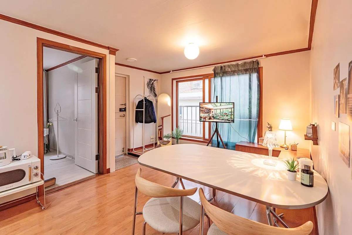 Image 5 of New, 3min to Hapjeong St, Airport bus stop, 10min to Hongdae & Mangwon Market, Han River Park, 2BR 2QB full of sunshine, Hotel bedding, City Nature