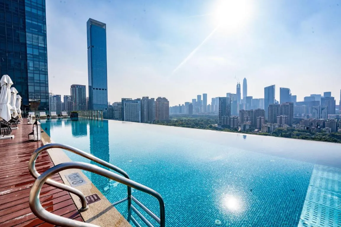 Image of Fraser Suites Shenzhen, Near Huaqiang North Business Zone and next to shopping mall complex, with direct subway access