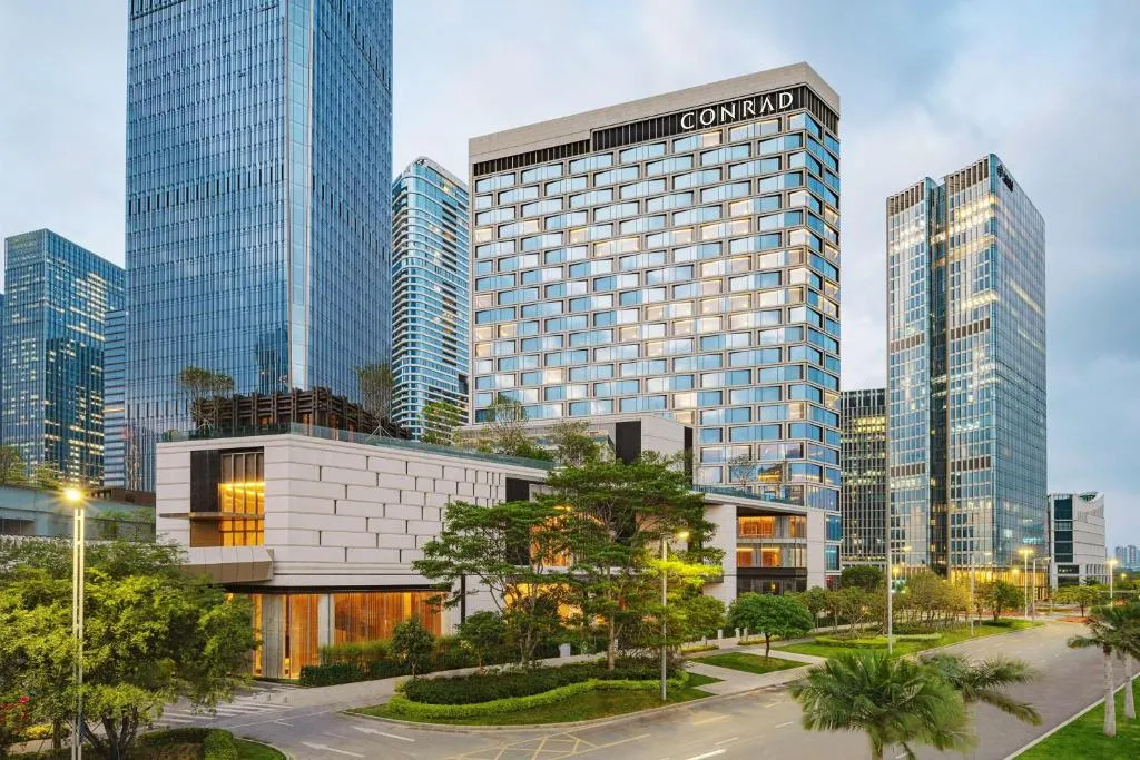 Image of Conrad Shenzhen, the first art museum hotel in Greater Bay Area with the stunning bay and sunset view in the hotel terrace