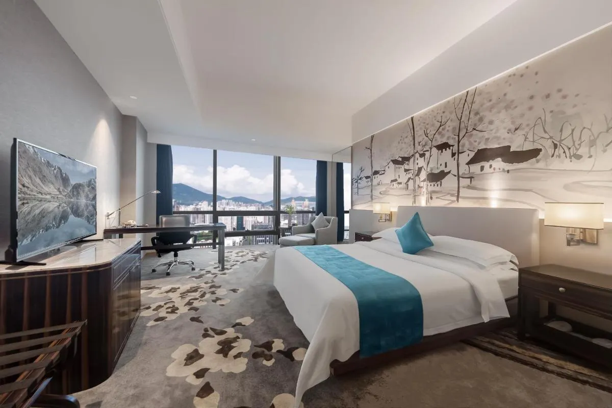 Image 5 of Huaqiang Plaza Hotel Shenzhen, Enjoy Complimentary Mini Bar & Night Snack, Breakfast included guests also enjoy complimentary afternoon tea
