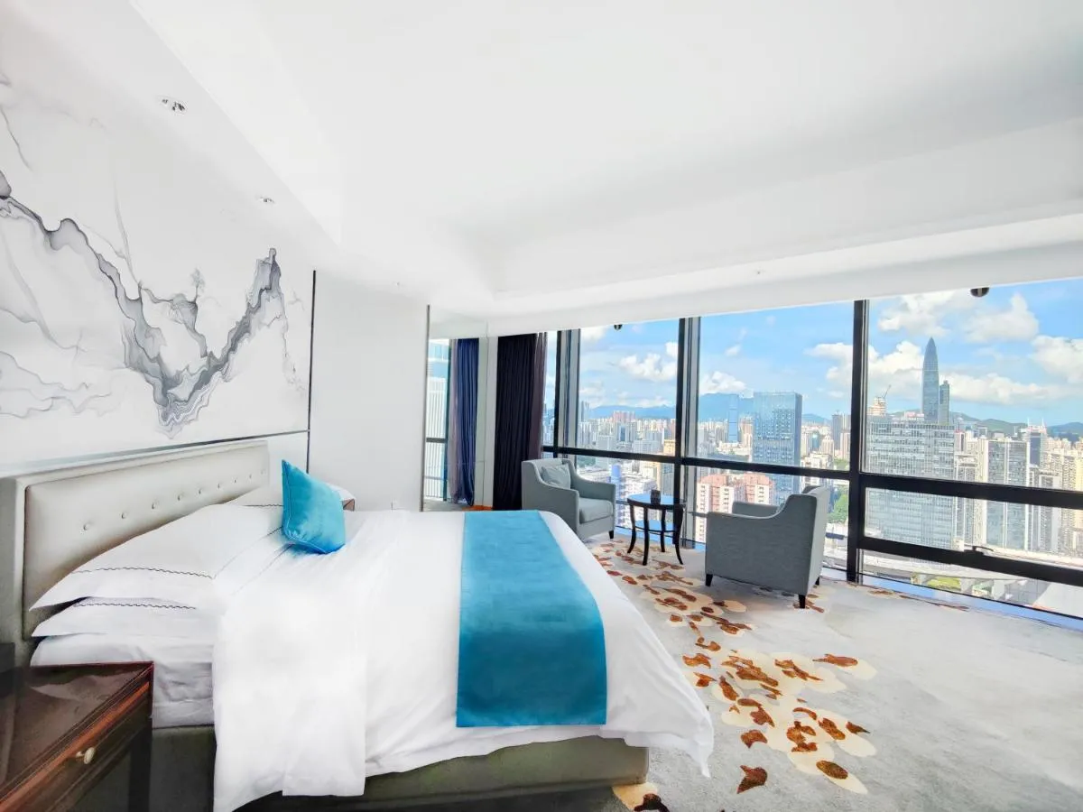 Image 2 of Huaqiang Plaza Hotel Shenzhen, Enjoy Complimentary Mini Bar & Night Snack, Breakfast included guests also enjoy complimentary afternoon tea