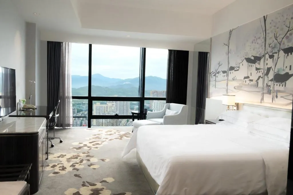 Image of Huaqiang Plaza Hotel Shenzhen, Enjoy Complimentary Mini Bar & Night Snack, Breakfast included guests also enjoy complimentary afternoon tea