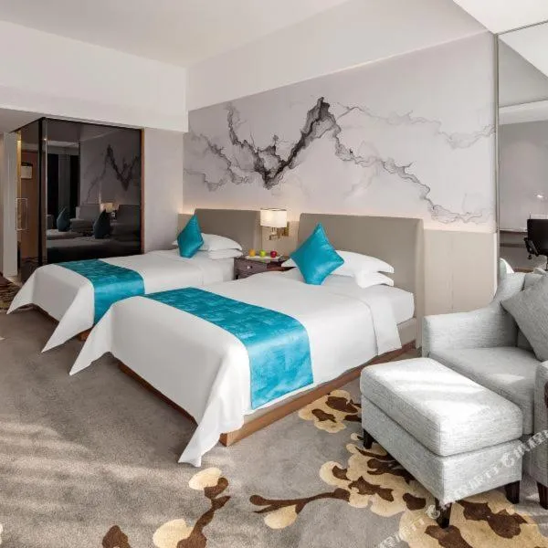 Image 3 of Huaqiang Plaza Hotel Shenzhen, Enjoy Complimentary Mini Bar & Night Snack, Breakfast included guests also enjoy complimentary afternoon tea