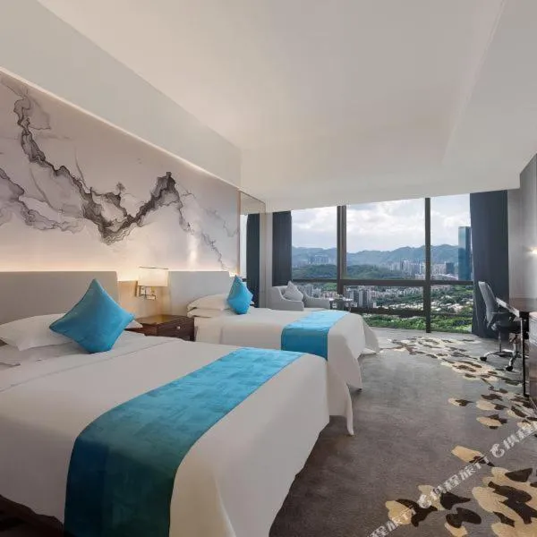 Image 4 of Huaqiang Plaza Hotel Shenzhen, Enjoy Complimentary Mini Bar & Night Snack, Breakfast included guests also enjoy complimentary afternoon tea