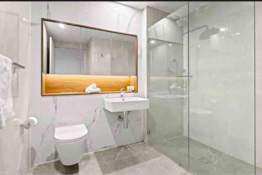 Image 2 of Classy Sleek Two Bedroom Apartment with Expansive River Views in the Heart of Sydney’s Second CBD