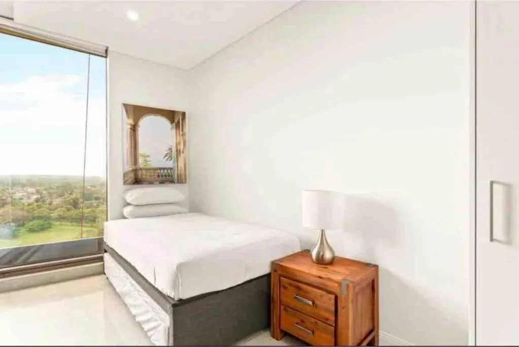 Image 1 of Classy Sleek Two Bedroom Apartment with Expansive River Views in the Heart of Sydney’s Second CBD