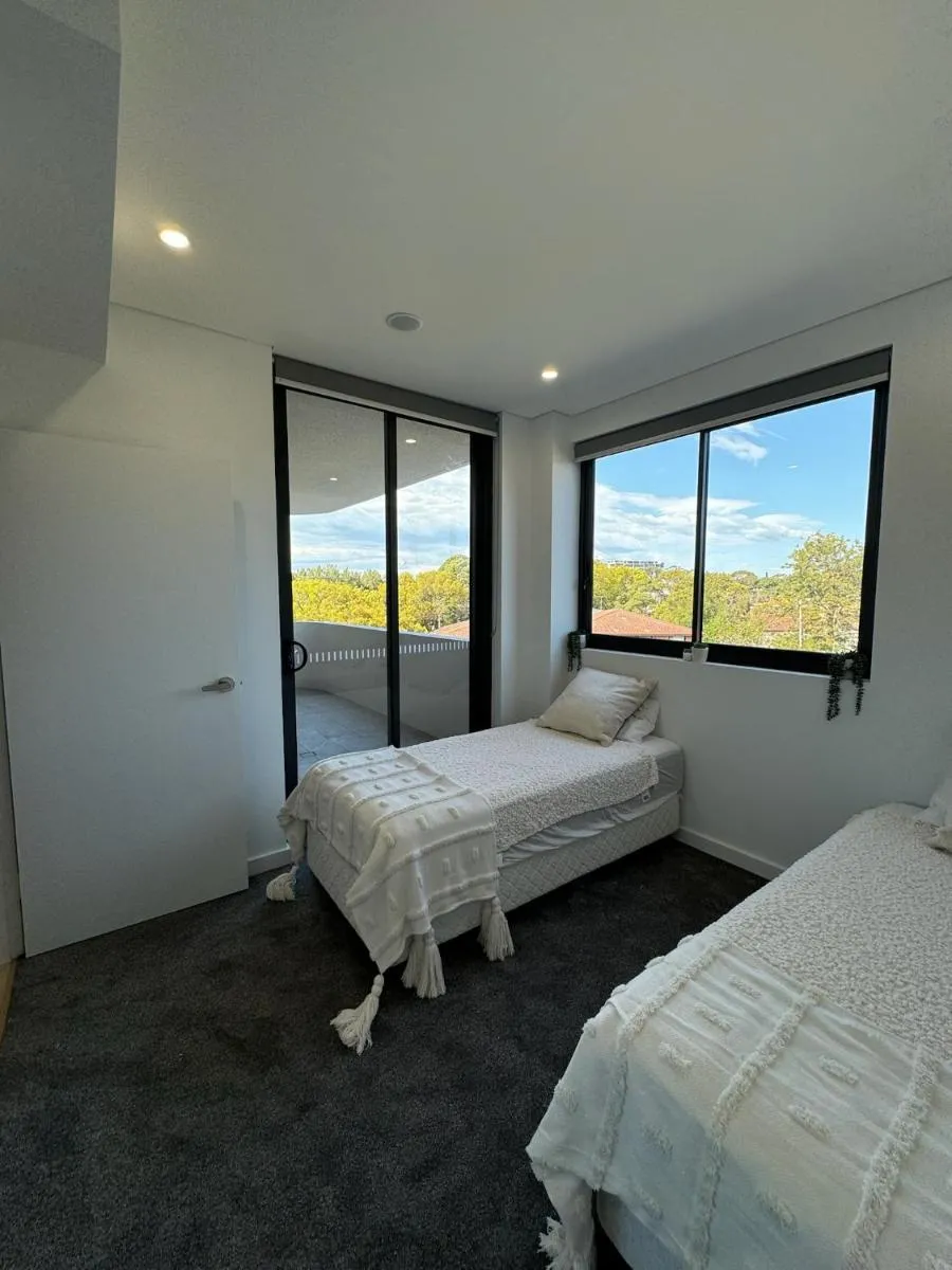 Image 6 of Modern 2BR Suite with Balcony & Parking near Airport