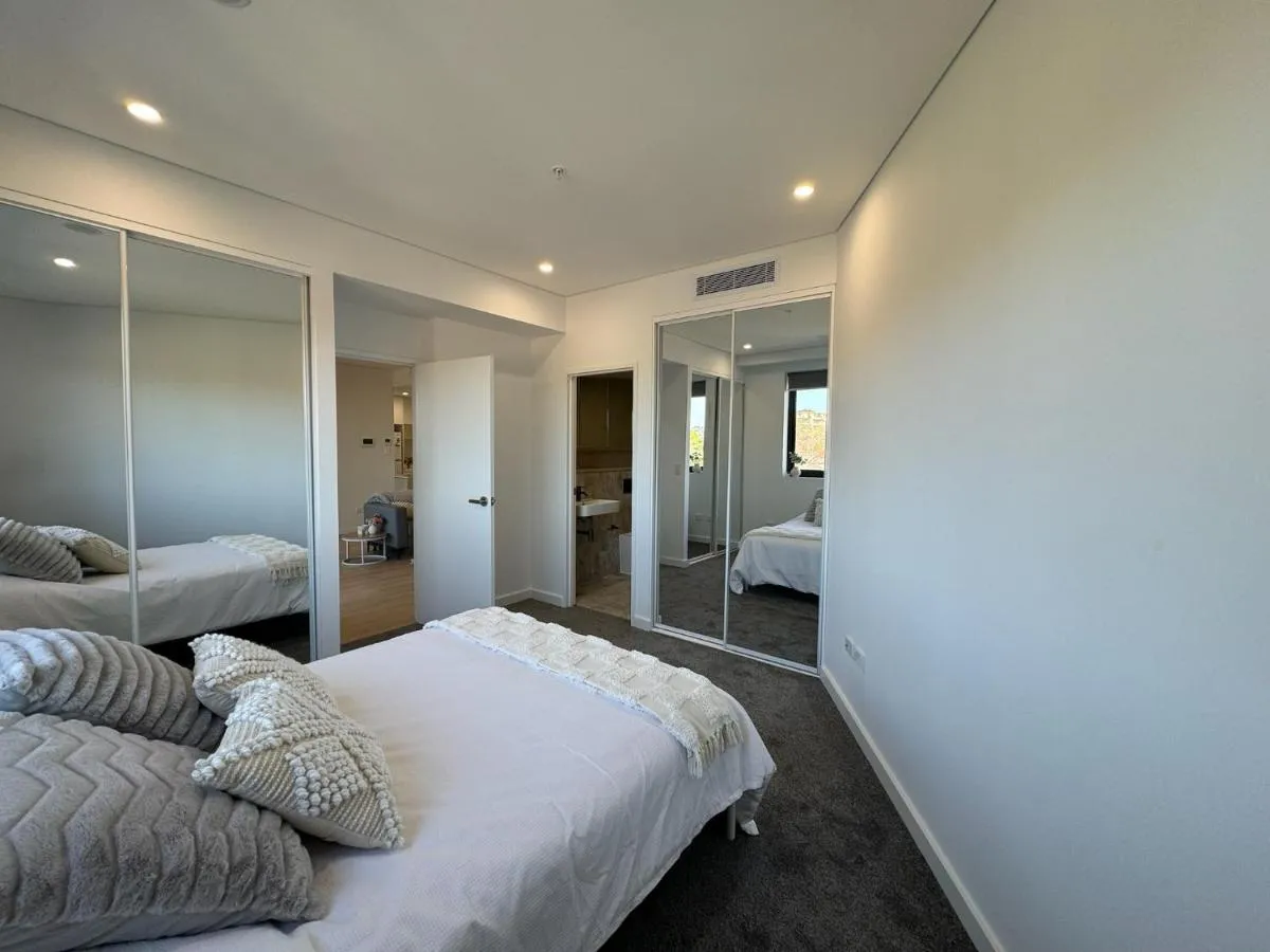 Image 1 of Modern 2BR Suite with Balcony & Parking near Airport