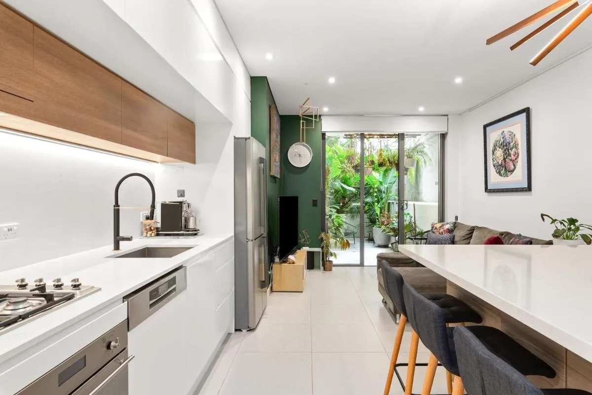 Image 3 of The Green Haven – Lush Industrial Chic Living