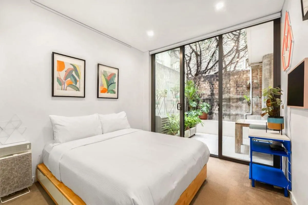 Image 1 of The Green Haven – Lush Industrial Chic Living