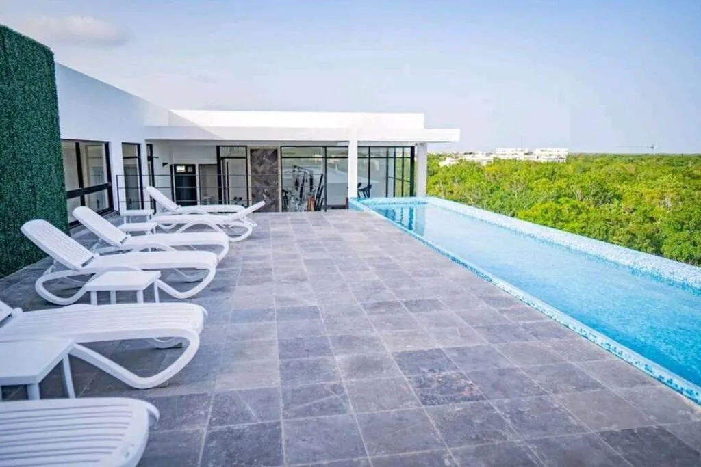 Image 3 of 2-level apartment in Aldea Zama with private splash pool.