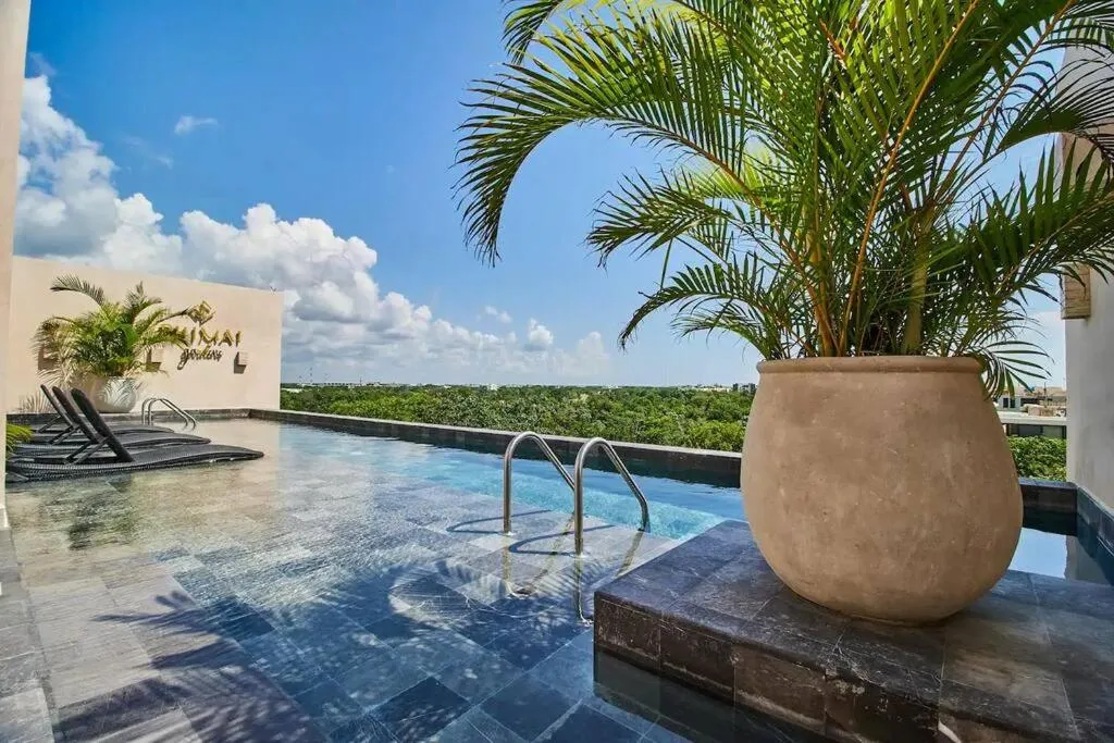 Image 3 of Frida’s Artsy Condo with own mural, outdoor tub & rooftop pool