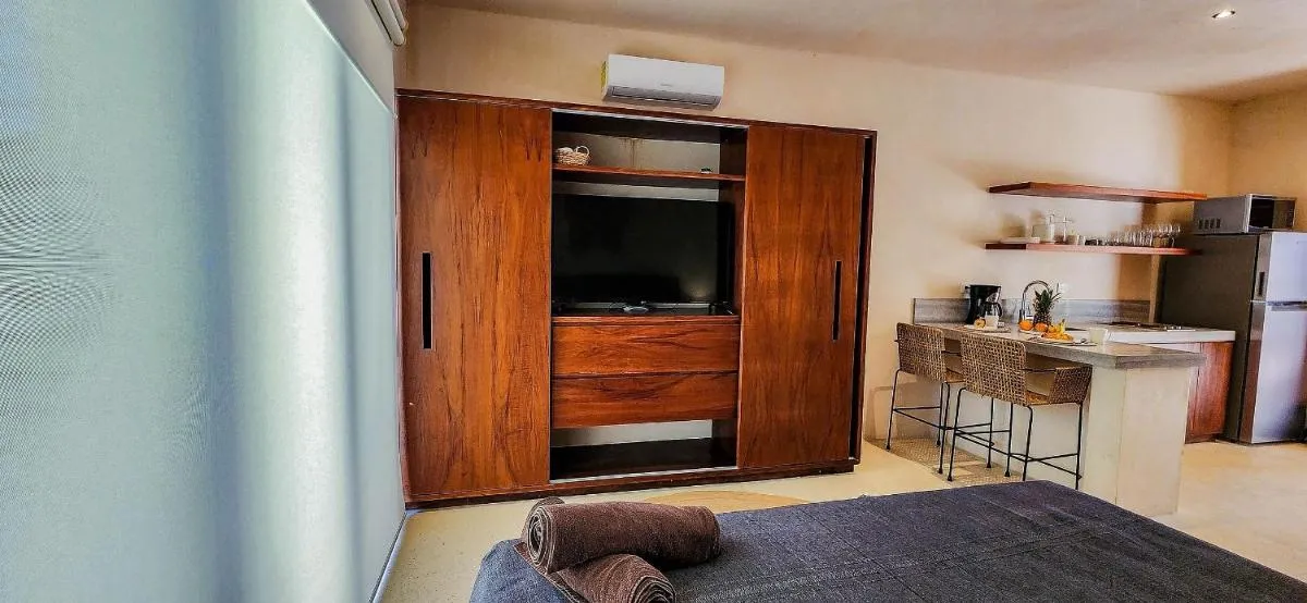 Image 4 of Hermoso estudio con acceso directo a la piscina