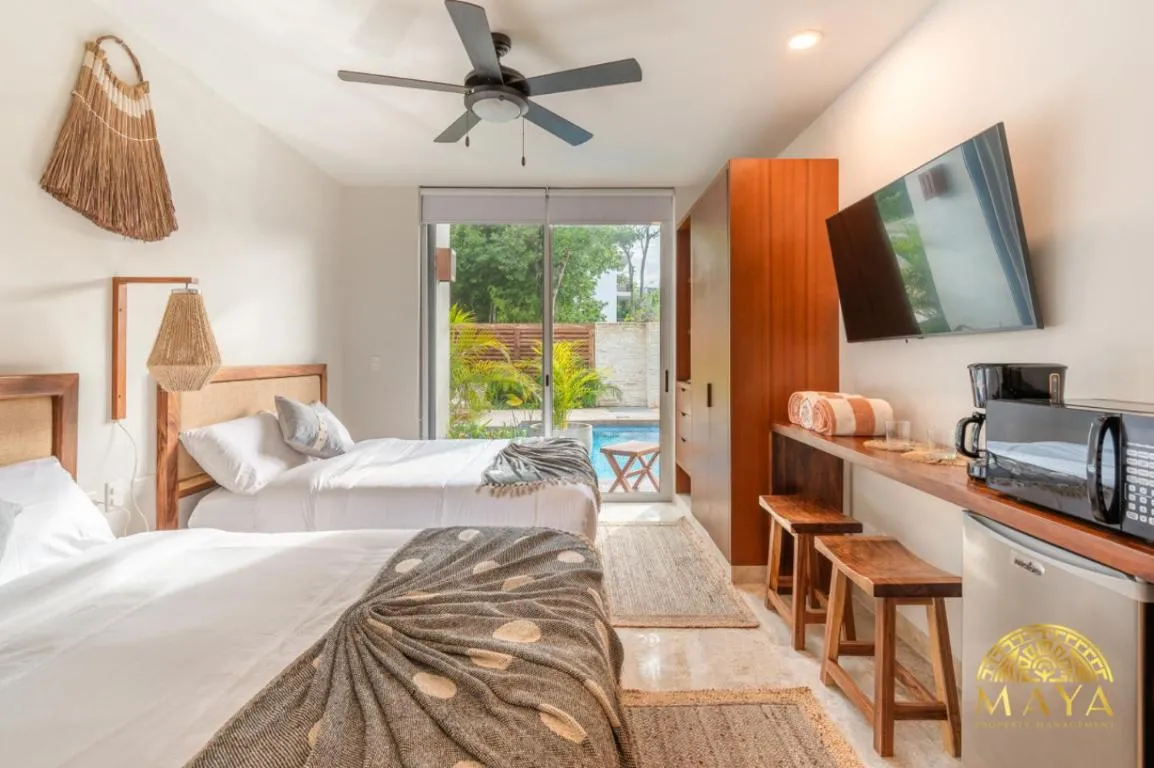 Image of NHOA 101C Lux 1BR Condo Pool access in Aldea Zama