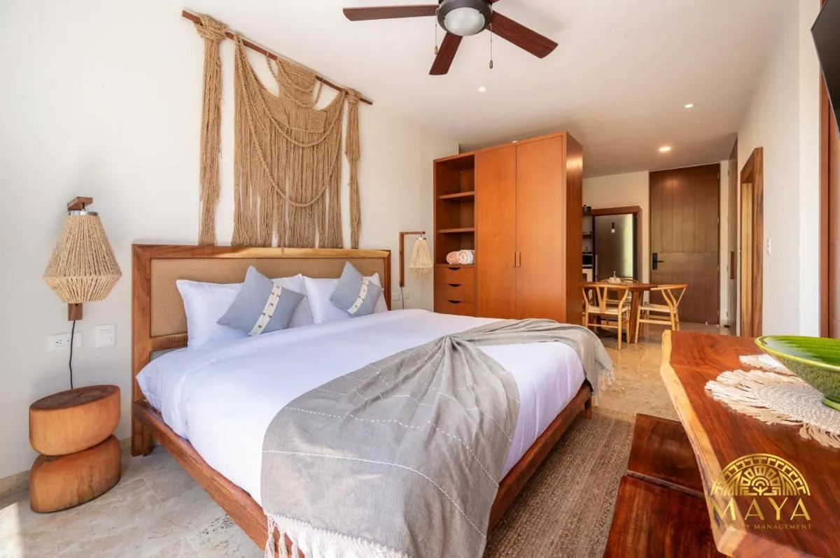 Image 1 of NHOA 207B Lux 1BR Condo Pool View in Aldea Zama