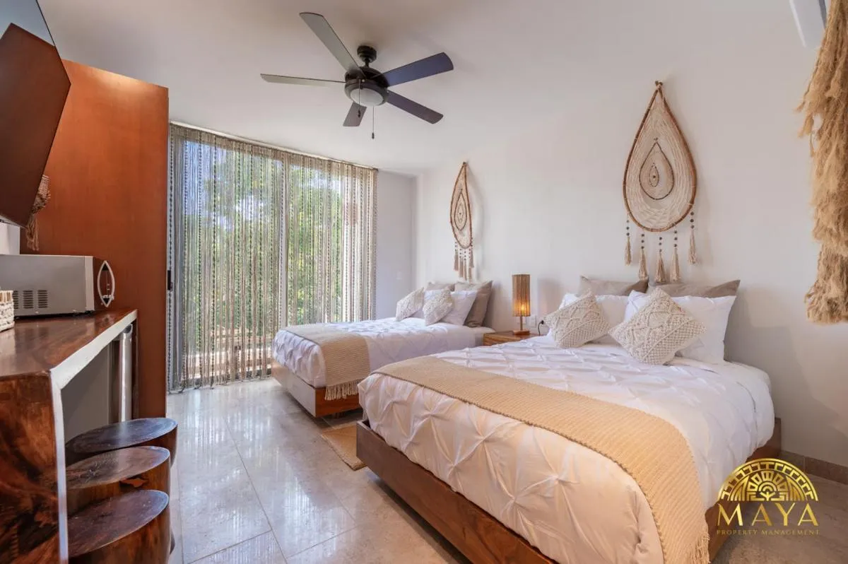 Image 1 of NHOA 302A Lux 2BR Condo Top Jungle View Aldea Zama