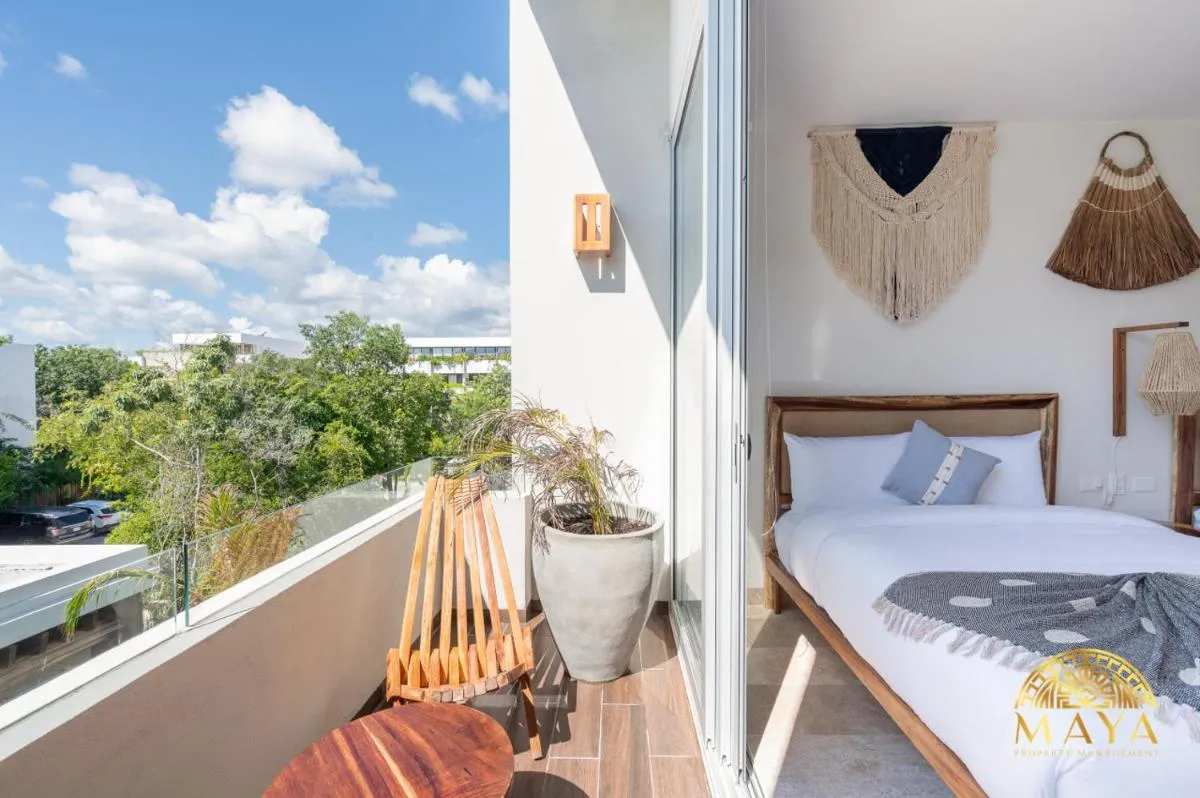 Image 1 of NHOA 307C Lux 1BR Condo Pool View in Aldea Zama