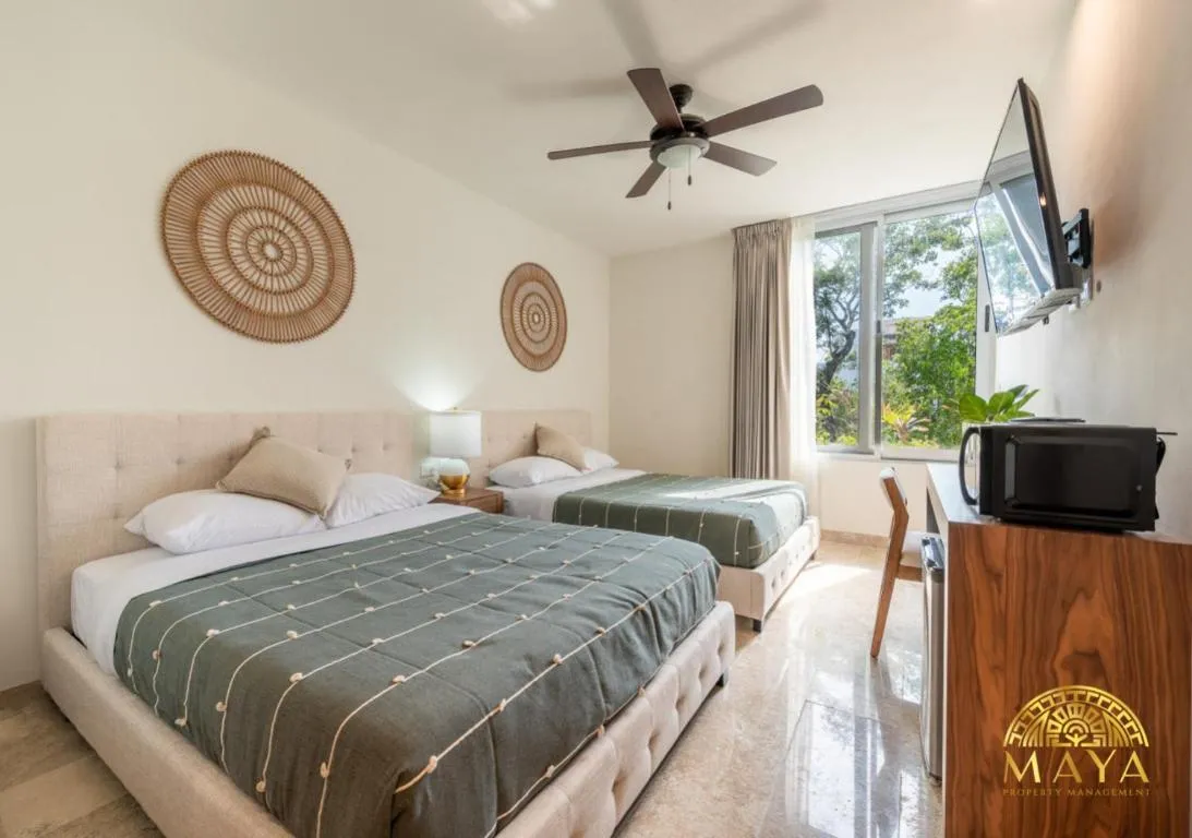 Image of NHOA 309C Lux 1BR Condo Pool View in Aldea Zama