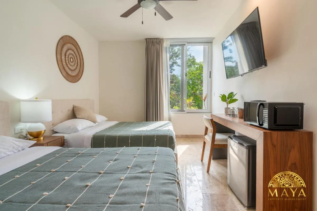 Image 1 of NHOA 309C Lux 1BR Condo Pool View in Aldea Zama