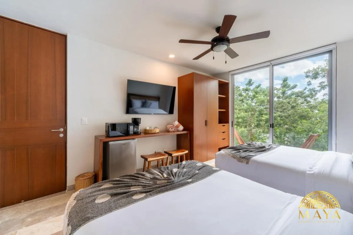 Image 1 of NHOA 311C Lux 1BR Condo Pool View in Aldea Zama