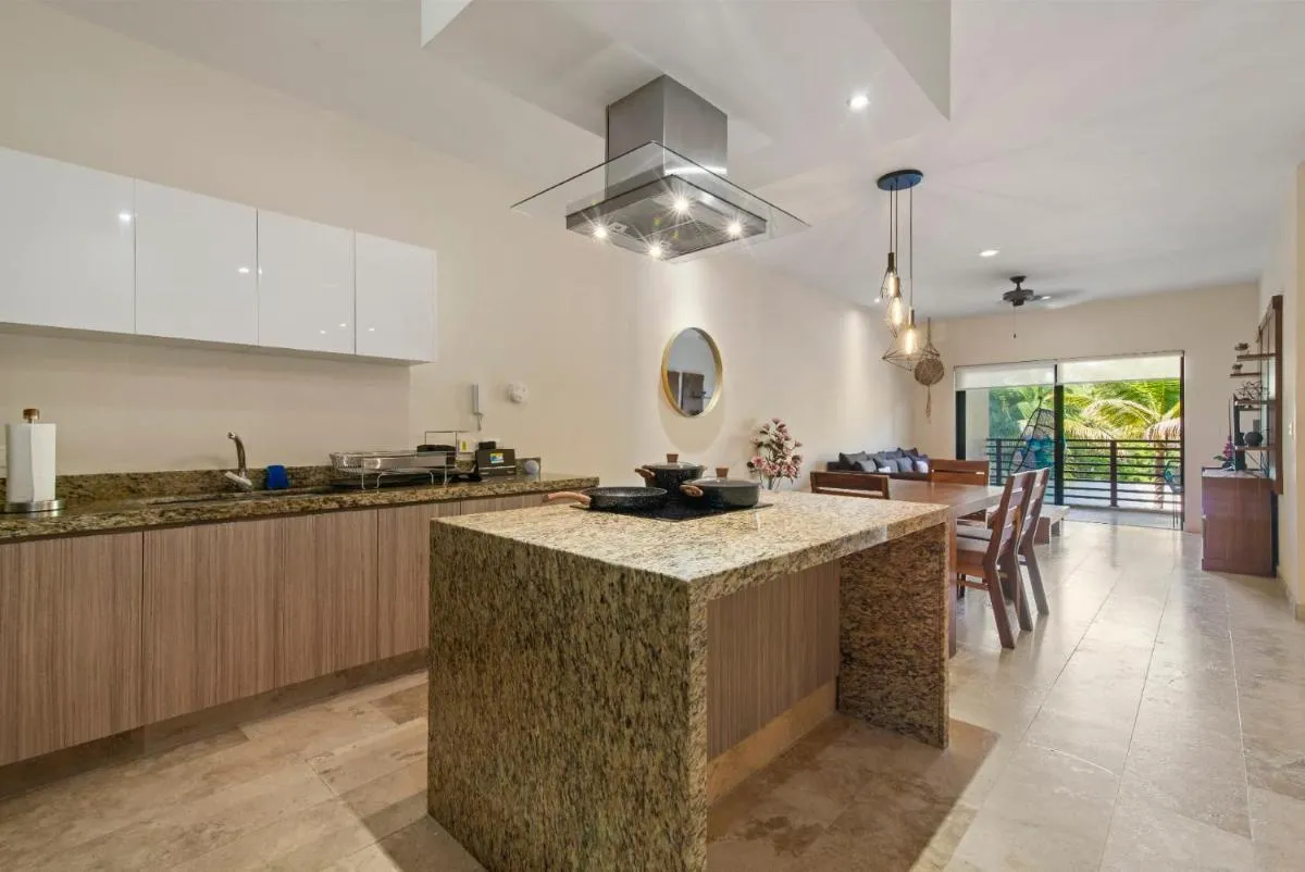 Image 3 of Tropical Elegance: Luxurious Apt with Pool View