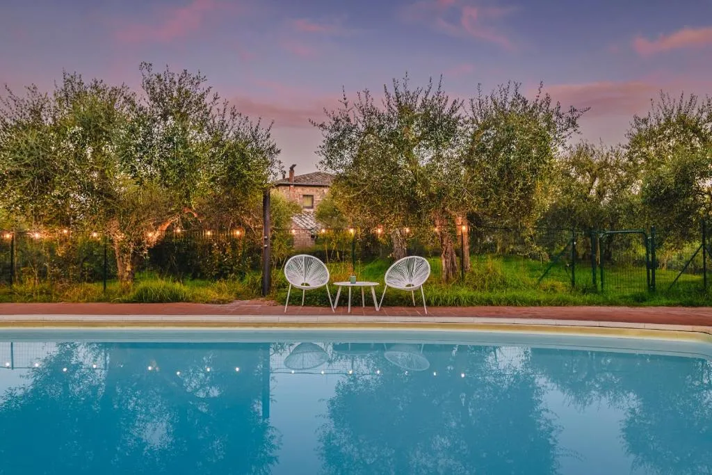 Image of Podere Mencoini, stylish villa with private pool and olive garden