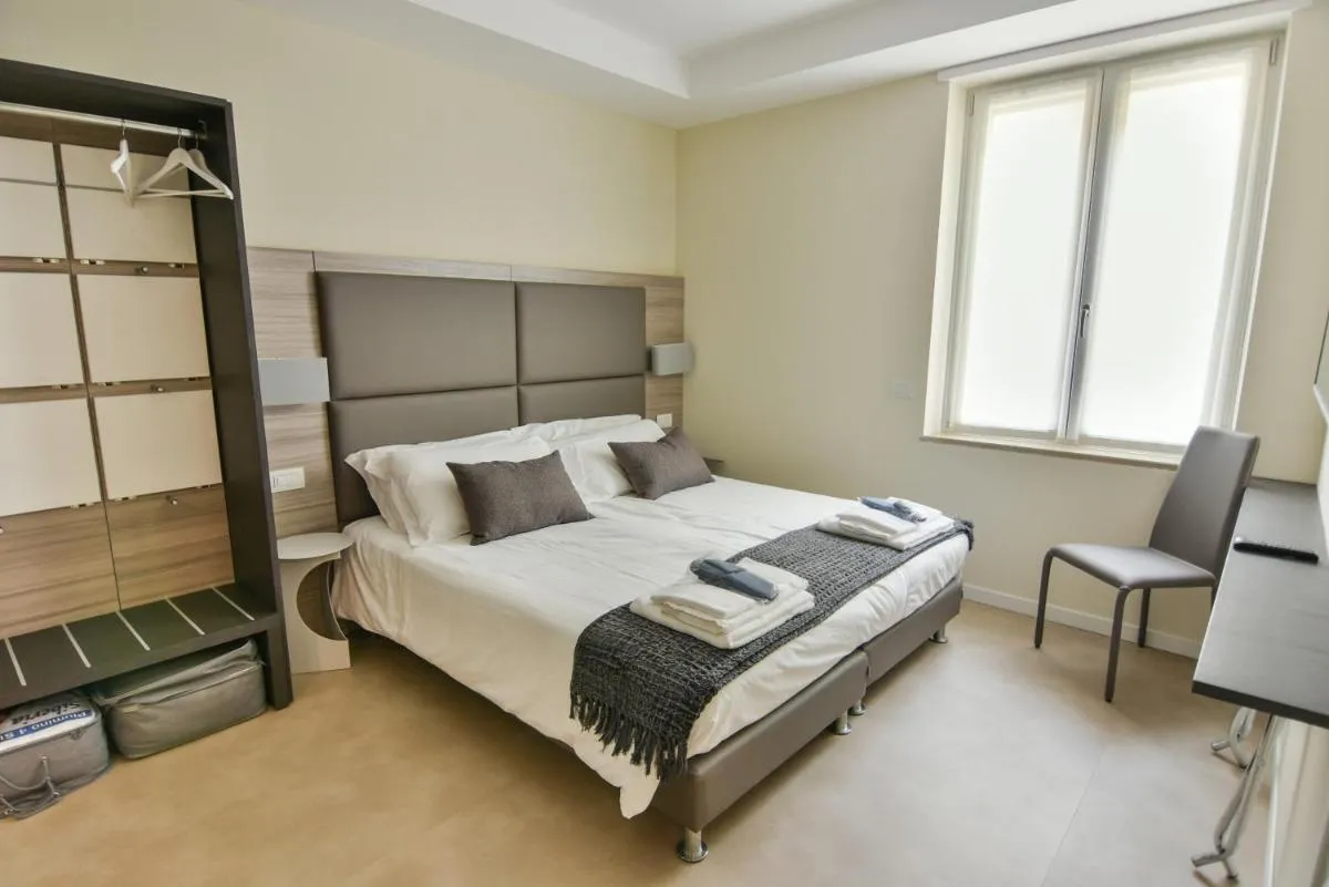 Image 1 of 3 Amici Suites