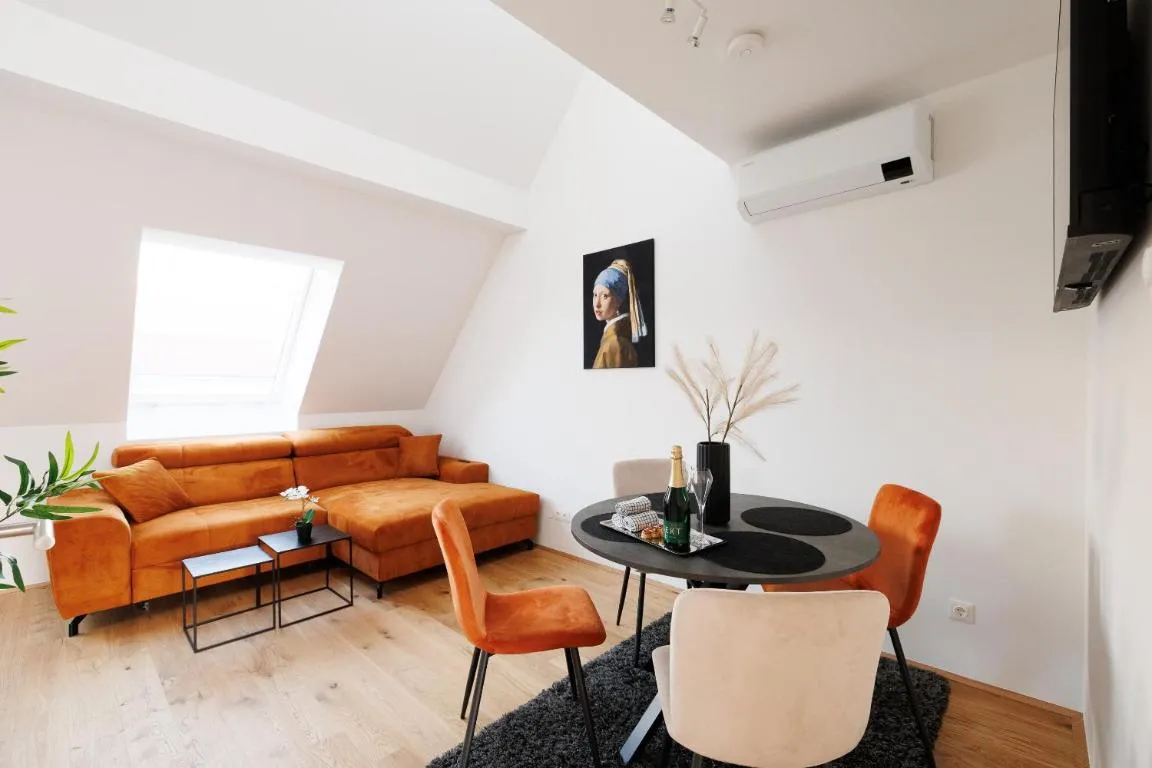 SYMPHONY Apartments 42 – Modern Loft with Terrace and Grill in Central Location