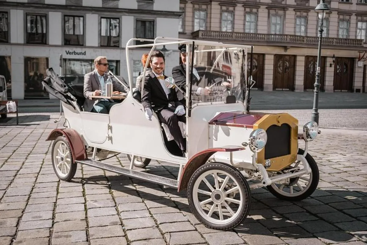 Image 1 of City Sightseeing Tour in an Electro Vintage Car (up to 5 people)