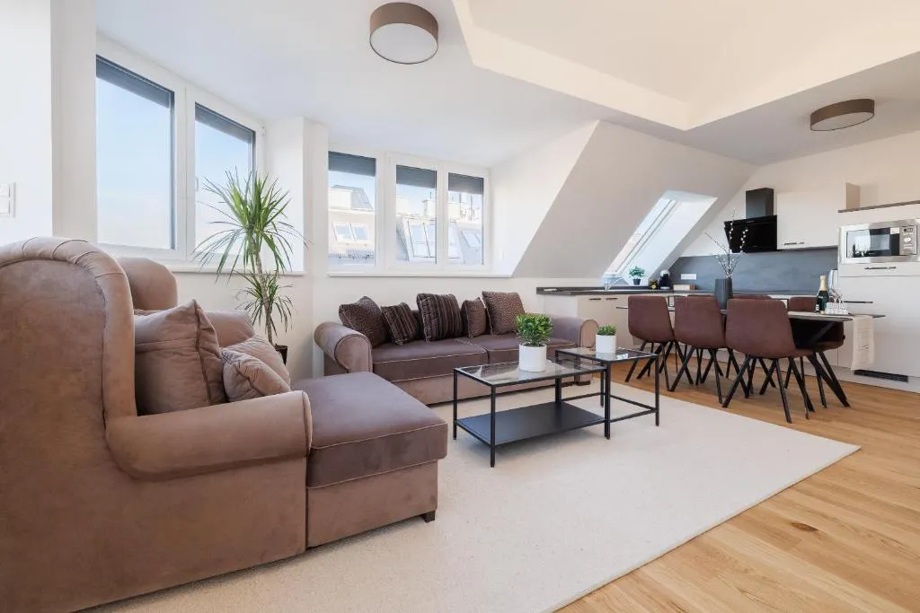 SYMPHONY Apartments 40 – Modern Loft with Terrace and Grill in Central Location