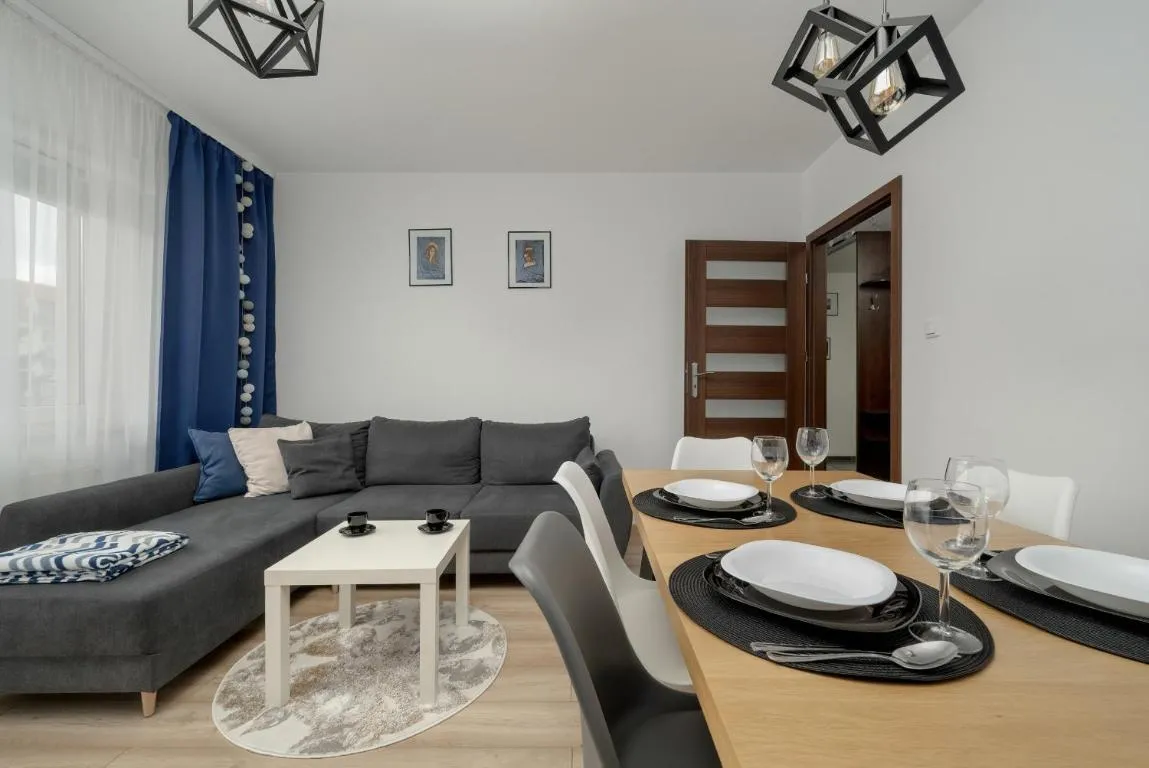 Image of Klimasa White&Blue Apartment with Balcony in Wrocław by Noclegi Renters