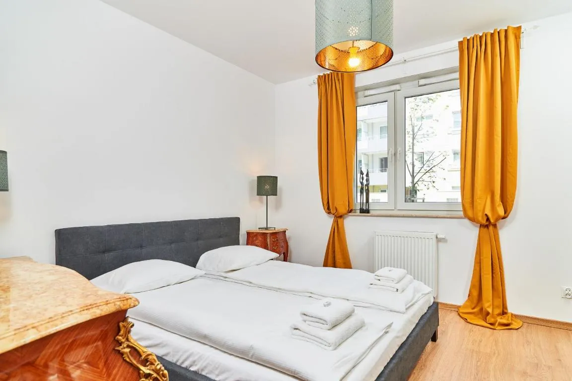 Image of Vintage Apartment in New Estate with PARKING – Krzyki Wrocław by Noclegi Renters