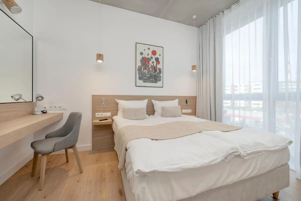 Image 1 of Beautiful White – Beige Apartment with Balcony in Wrocław by Noclegi Renters