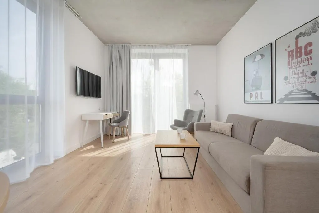 Image of Beautiful White – Beige Apartment with Balcony in Wrocław by Noclegi Renters