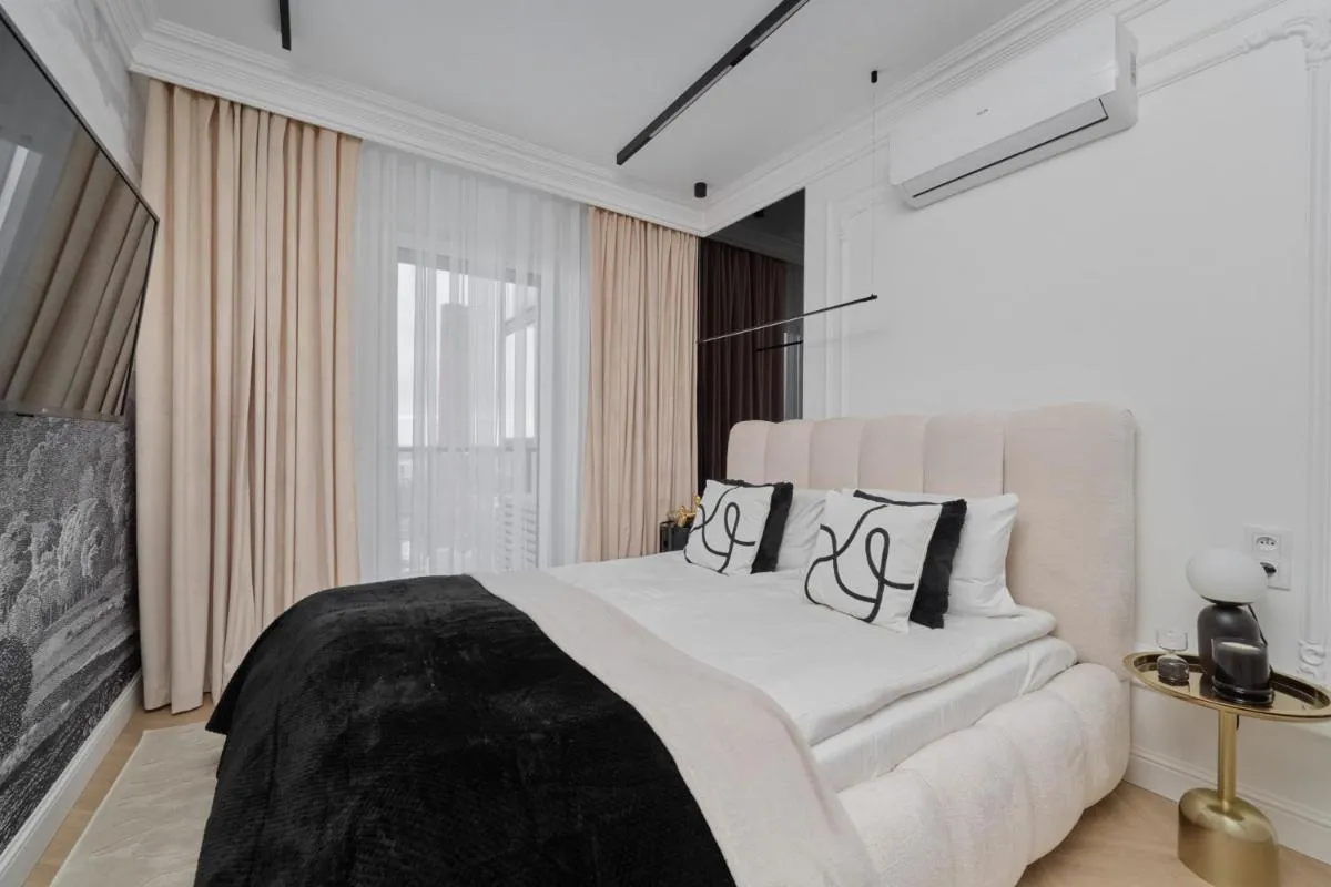 Image 1 of Luxurious 13th Floor Beige Apartment in Wrocław with Furnished Balcony by Renters Prestige