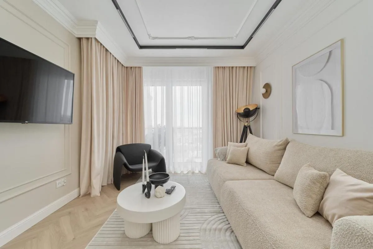 Image 2 of Luxurious 13th Floor Beige Apartment in Wrocław with Furnished Balcony by Renters Prestige