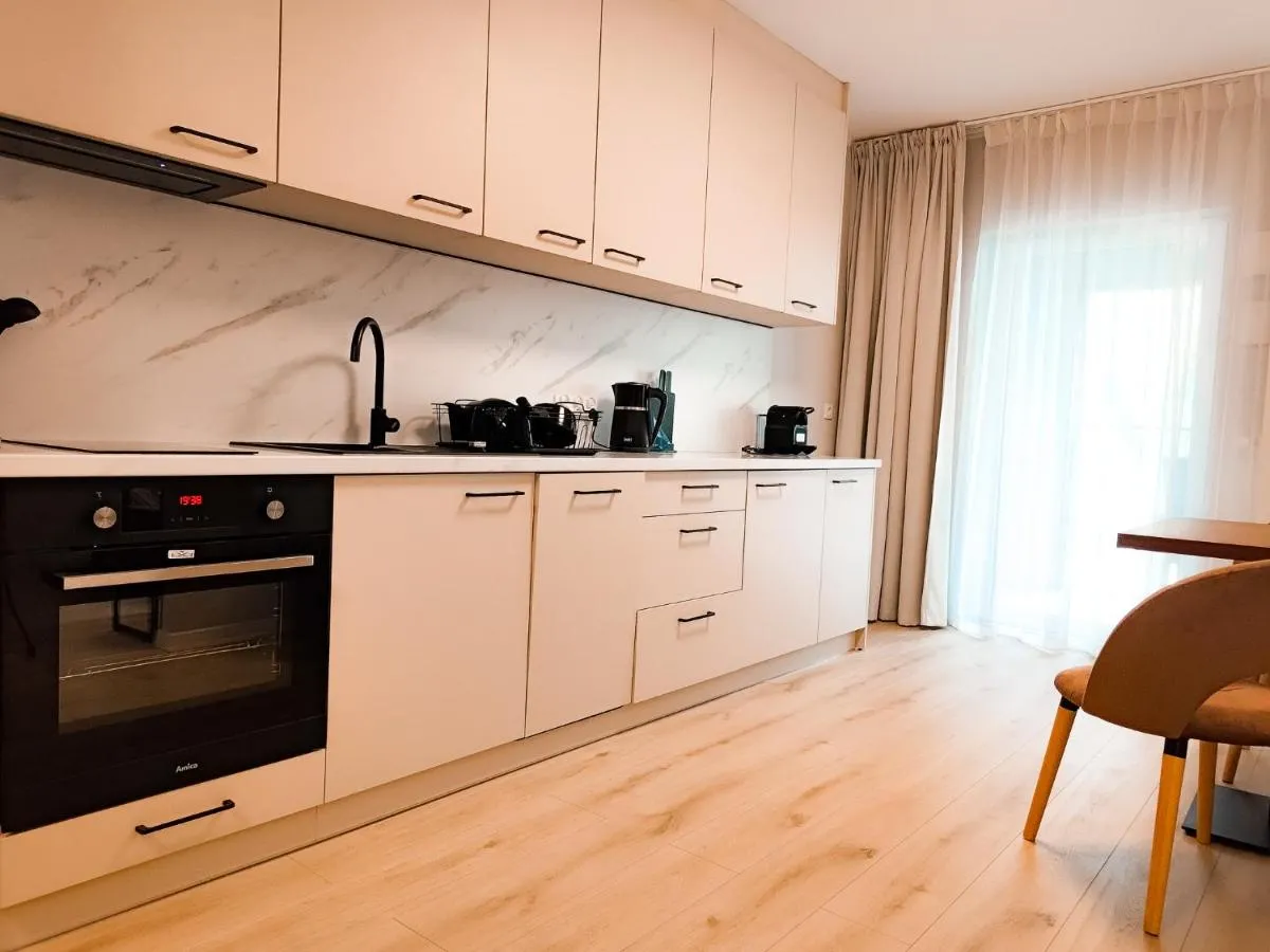 Image 3 of Modern City Square Apartment with Balcony
