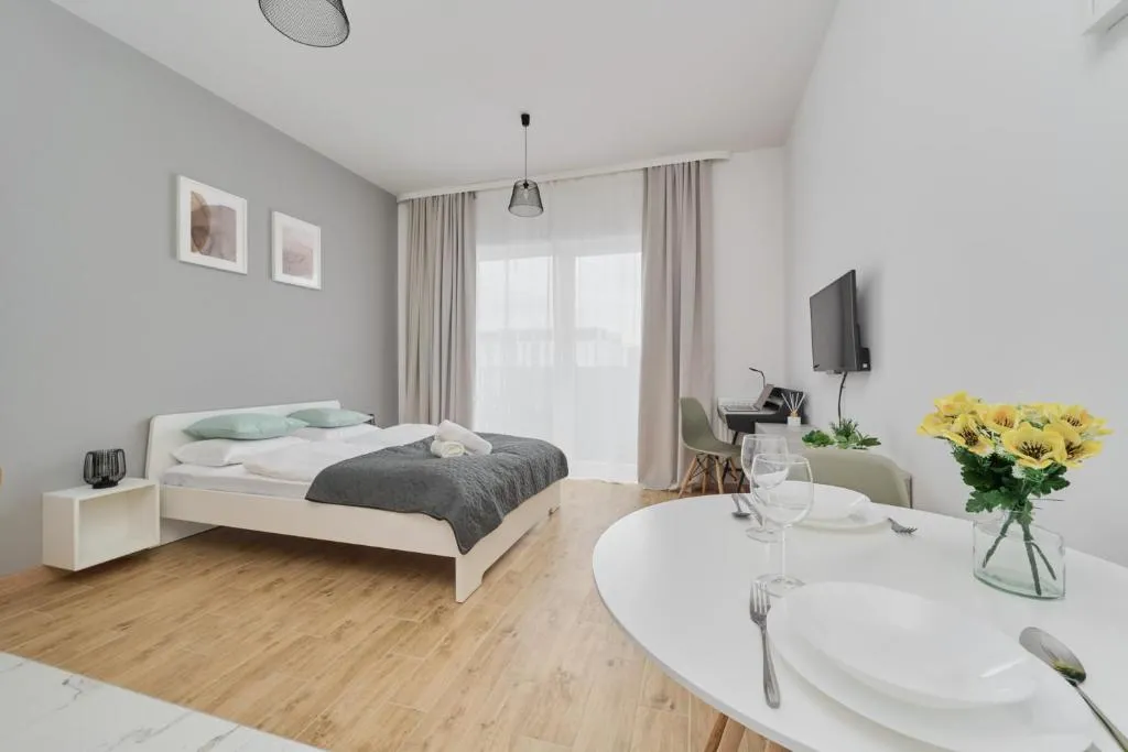 Image of Modern Studio Słonimskiego with Balcony by Noclegi Renters