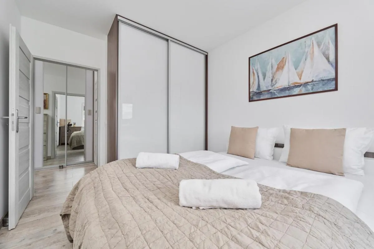Image 1 of Spacious Apartment suitable for Remote Work with Balcony & Parking by Noclegi Renters
