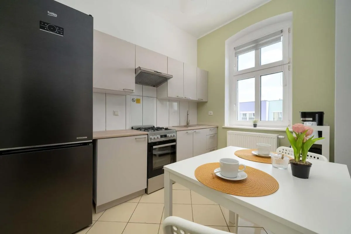 Image 2 of Spacious Apartment with WiFi & Smart TV Remote Working by Noclegi Renters