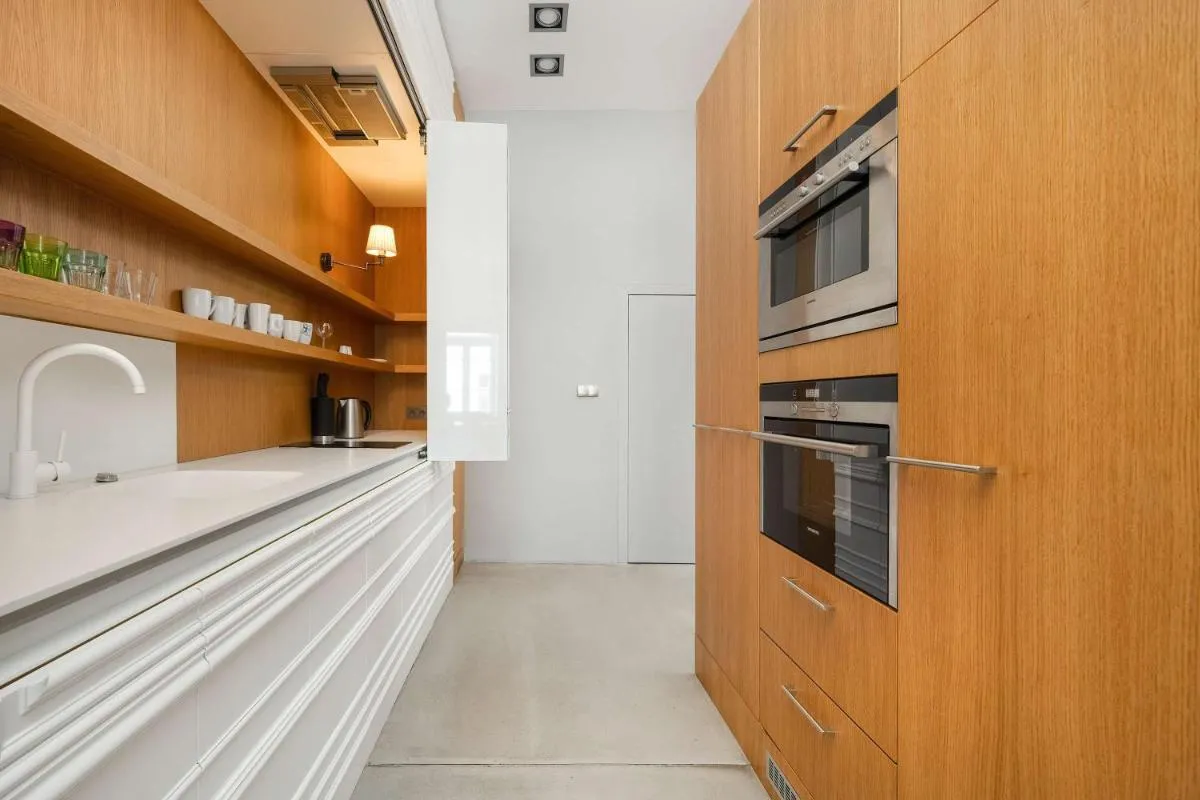 Image 3 of Unique and Bright Library Apartment Near Old Town in Wrocław by Noclegi Renters