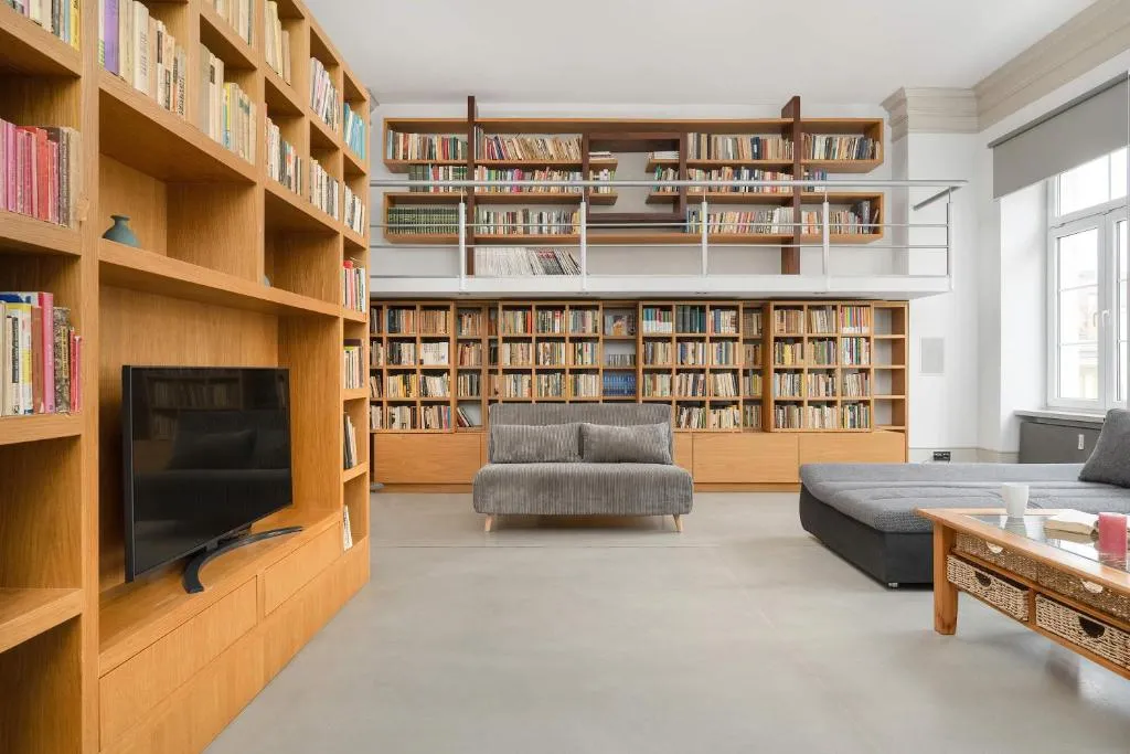 Image of Unique and Bright Library Apartment Near Old Town in Wrocław by Noclegi Renters